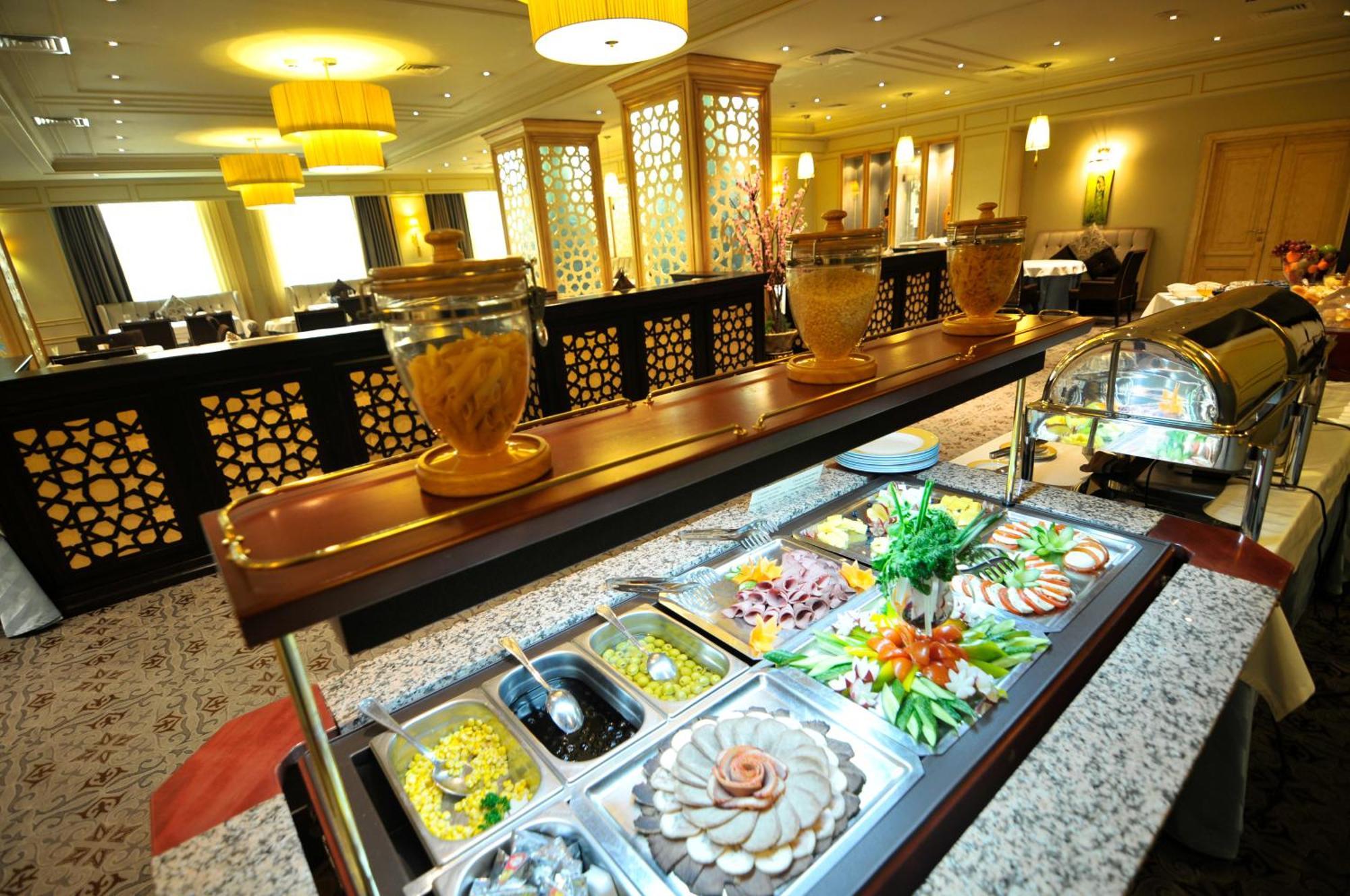 Grand Tien Shan Hotel Almatî Restaurant foto